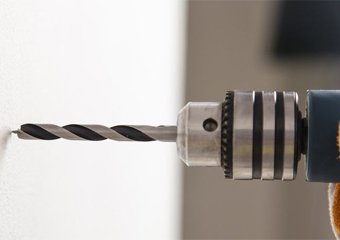 How to Drill a Hole in the Wall